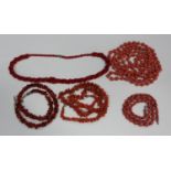 A single row necklace of graduated branch coral, length 57cm, a single row necklace of irregular