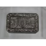 A late George III silver rectangular castle top snuff box, the hinged lid decorated in relief with a