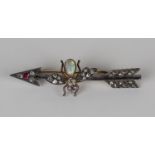 A late Victorian diamond, opal and ruby brooch, circa 1900, designed as a winged insect perched on