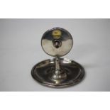 A George V silver trumps marker, the central rotating disc raised above a circular dish shaped