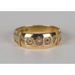 A Victorian 18ct gold ring, mounted with a central half-pearl, Birmingham 1881, ring size approx