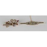 A gold, seed pearl and ruby brooch, designed as a stylized ribbon bow, detailed '15ct', width 3.5cm,