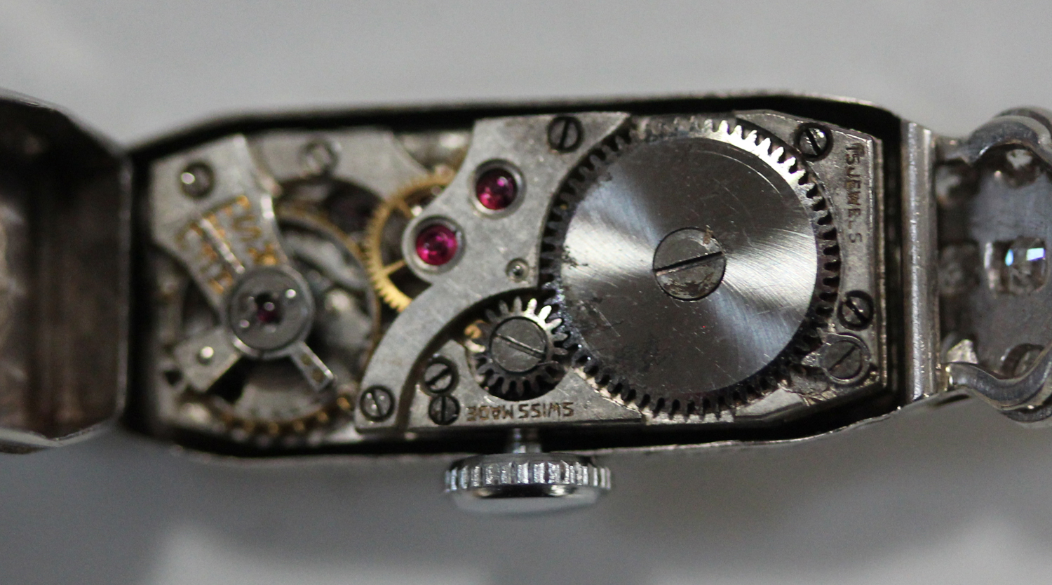 A platinum and diamond lady's dress wristwatch with jewelled lever movement, the silvered dial - Image 5 of 6