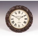 A Victorian mahogany cased circular wall timepiece with brass eight day single fusee movement, the