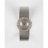 A Bueche Girod 18ct white gold and diamond lady's bracelet wristwatch, the signed matt silvered dial