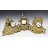 A late 19th century gilt spelter mantel clock with eight day movement striking on a bell via an