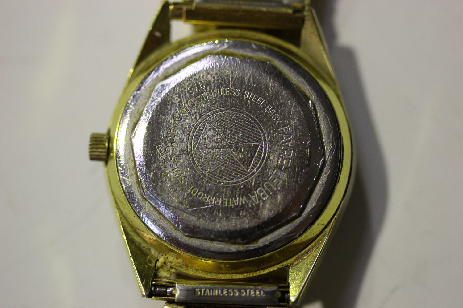 A Favre-Leuba Harpoon gilt metal fronted and steel backed gentleman's wristwatch, the signed black - Image 2 of 3