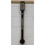 A mid-19th century figured mahogany stick barometer, the ivorine dial with vernier scale and