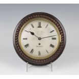 A mid-19th century mahogany circular cased ship's style wall timepiece with eight day chain fusee