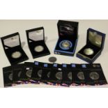 A collection of Royal Mint commemorative coins, including a London Olympics silver proof five pounds