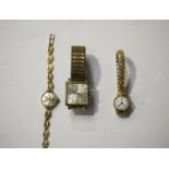 A Tissot 9ct gold lady's bracelet watch, the signed silvered dial with baton hour markers, case