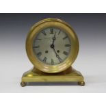 An early 20th century American bronze circular cased ship's clock mantel timepiece by Chelsea