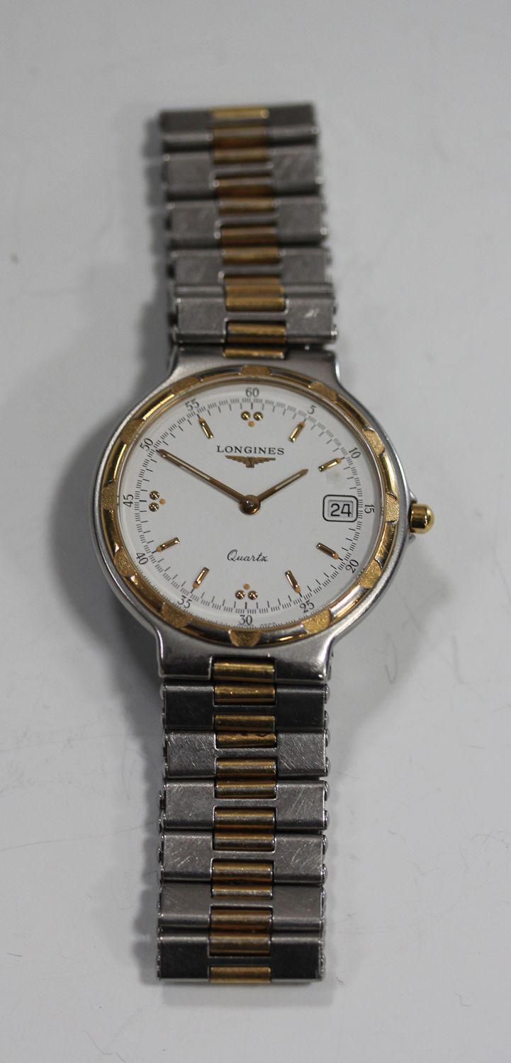 A Longines Quartz stainless steel and gilt metal gentleman's bracelet wristwatch, the signed white - Image 4 of 5