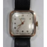 An Arnex 9ct gold curved square cased gentleman's wristwatch with signed jewelled movement, the