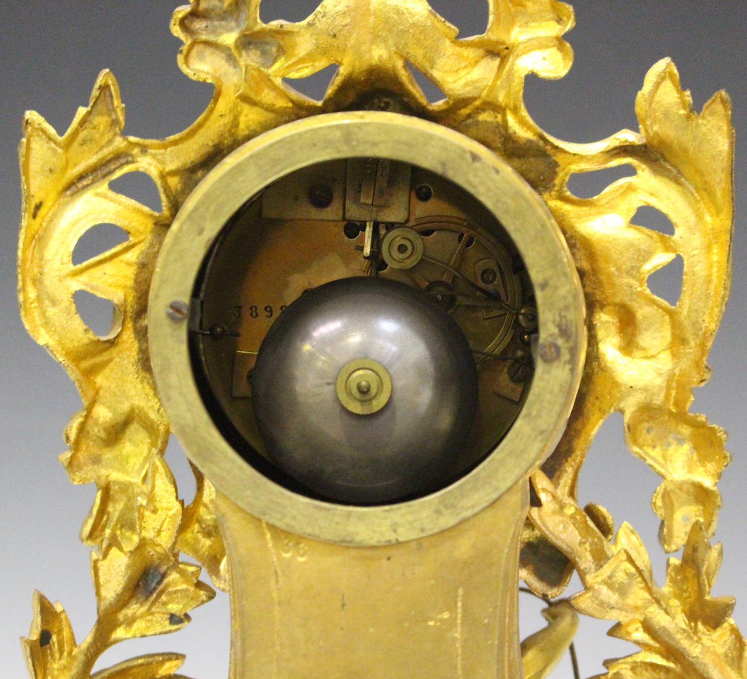 A late 19th century French gilt metal mantel clock with eight day movement striking on a bell via an - Image 2 of 2