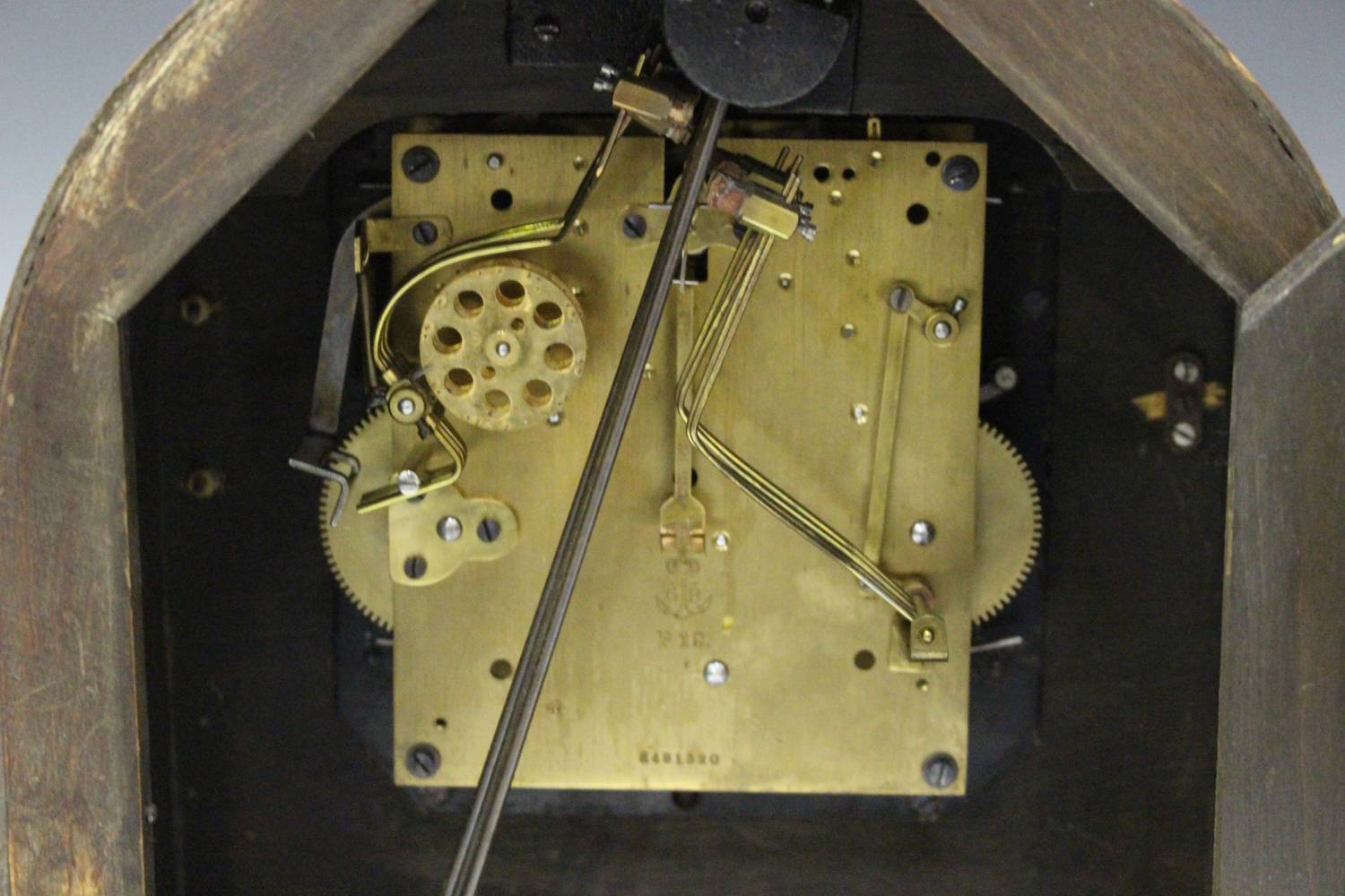 A George V oak mantel clock with eight day movement chiming on gongs, the backplate with Gustav - Image 2 of 3