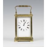 An early 20th century French brass carriage clock by Henri Jacot, with eight day movement striking