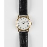 A Universal Genève 18ct gold circular cased gentleman's wristwatch, the signed dial with black Roman