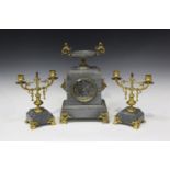 A late 19th century French gilt brass and grey marble mantel clock garniture, the clock with eight