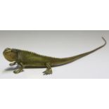 A 20th century cast brass model of a lizard, probably Indian, finely detailed and inset with red