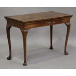 An 18th century mahogany serving table, fitted with a single cushion frieze drawer, on cabriole legs