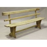 A mid-20th century wooden slatted bench, on shaped supports, height 87cm, length 205cm, depth 40cm.