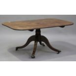 A Regency mahogany tip-top breakfast table with ebony stringing, raised on a turned column and sabre