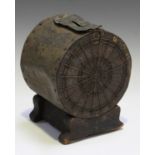 An early 20th century wooden and tin 'Darts Club' money box in the form of a dartboard, height 19cm,