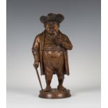 A late 19th century Swiss Black Forest carved softwood figural tobacco jar, finely modelled as a