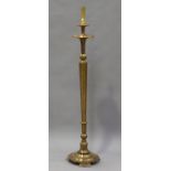 A 20th century Venetian giltwood lamp-standard, the reeded stem on a shaped base, height 153cm.