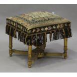 A 19th century Louis XVI style giltwood footstool with a period polychrome silkwork seat, raised