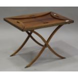 A 20th century mahogany campaign style butler's tray and folding stand, height 53cm, width 74cm,