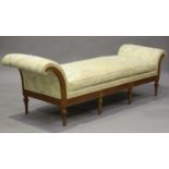 A 20th century Louis XVI style walnut day bed with carved decoration, upholstered in floral