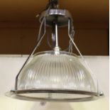 A pair of mid-20th century wrought metal and moulded glass industrial style ceiling lights, height