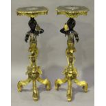 A pair of early 20th century Venetian giltwood, ebonized and painted softwood blackamoor stands,