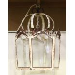 A mid-20th century French painted wrought metal hexagonal ceiling lantern, inset with glass