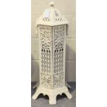 A late 19th/early 20th century white painted cast metal hexagonal conservatory heater of pierced