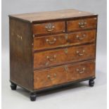 A 19th century George I style walnut chest of two short and three long drawers, on turned feet,