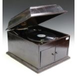 An HMV model 103 oak cased table-top gramophone with No. 4 sound box and bearing Harrods retail