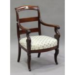 A 19th century French mahogany bar back elbow chair with scroll arms, the overstuffed seat raised on