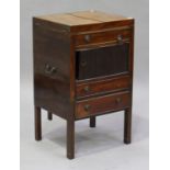 A George III mahogany gentleman's wash stand, the hinged top above three drawers and a cupboard,