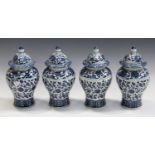 A set of four modern Chinese blue and white porcelain vases and covers of baluster form, height 23.