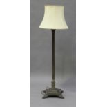 An Edwardian brass Corinthian column lamp-standard, on a stepped base, height 152cm.Buyer’s