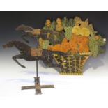 A sheet iron weather vane in the form of two race horses, mounted on an 'X' frame base, height 46cm,