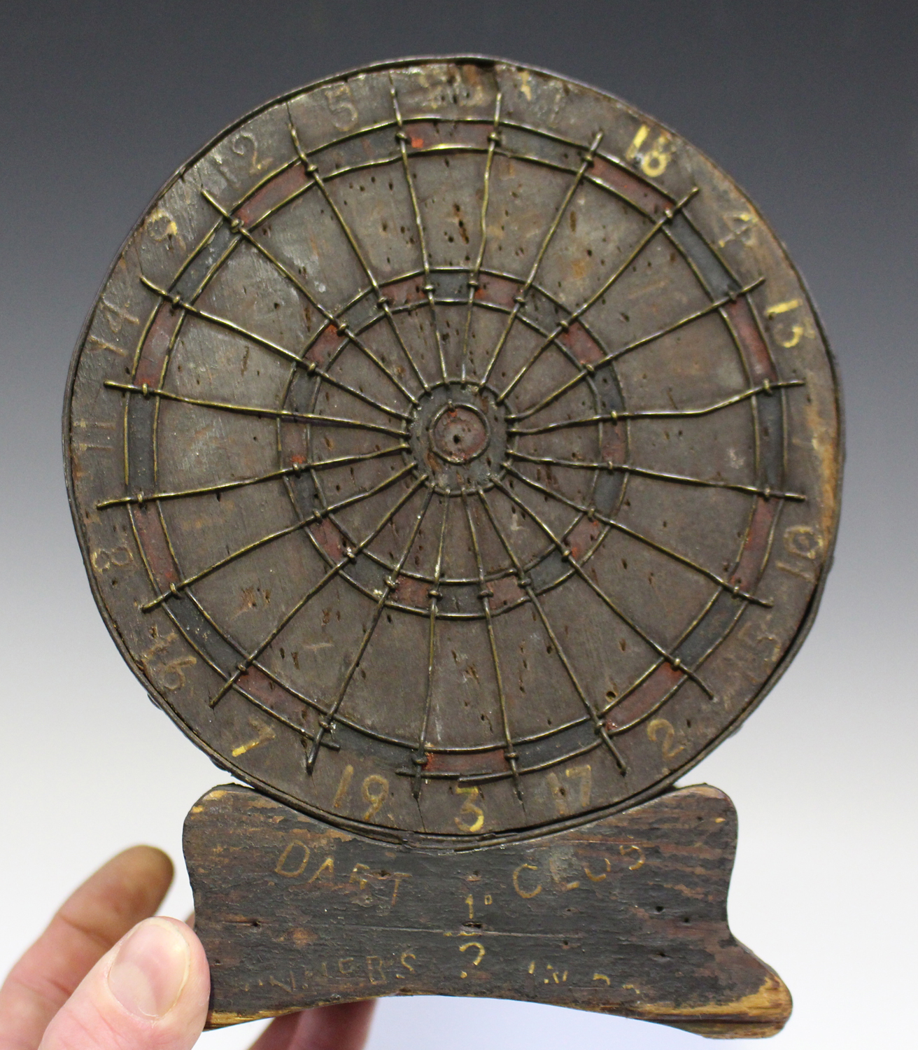 An early 20th century wooden and tin 'Darts Club' money box in the form of a dartboard, height 19cm, - Image 2 of 3
