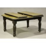 A late Victorian carved oak extending dining table with two extra leaves, height 71cm, extended
