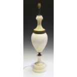 An early 20th century alabaster table lamp of ovoid form with gilt metal mounts, height 70cm.