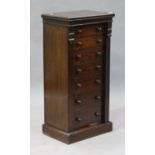 A Victorian mahogany Wellington chest by Maple & Co, fitted with seven drawers with turned