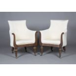 A pair of Regency mahogany framed tub back armchairs, upholstered in cream satin, on gilt metal