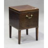 A George III mahogany wine cooler with boxwood stringing, the hinged lid raised on square tapering